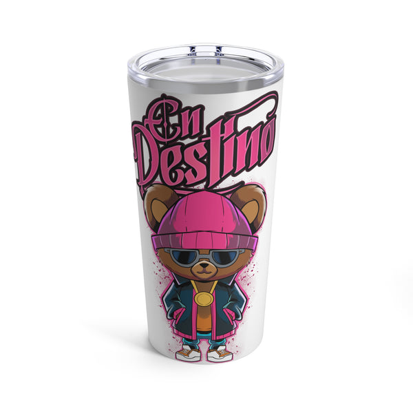 This tumbler showcases a charming design of a teddy bear, exuding a cool and calm vibe while wearing dark sunglasses. The phrase "En Destino" elegantly appears at the top of the design in a vibrant pink color, adding a playful touch to the overall aesthetic. This tumbler is perfect for anyone who loves unique and fun drinkware!
