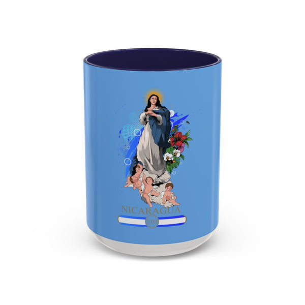 A blue ceramic coffee mug with a colorful floral design and an illustration of the Virgin Mary holding a child, with the name 'NICARAGUA' printed across the bottom.