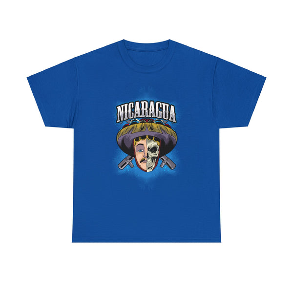 This unique shirt design is inspired by El Gueguense, a prominent festival character from Nicaragua. The artwork features a striking contrast with one side showcasing the intricate mask of El Gueguense and the other side displaying a detailed skull. At the top of the design, the word "Nicaragua" is boldly displayed, celebrating the rich cultural heritage of the country. The combination of these elements creates a visually captivating piece that pays homage to Nicaraguan traditions and folklore.