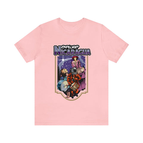 A pink women's t-shirt with a graphic print that includes a doll, a castle, and a space-themed background, titled 'EXPLORE NICARAGUA'.