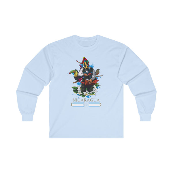 The Nicaragua shirt design features Macho Raton in the center, with birds on each side and native flowers throughout. The word "Nicaragua" is displayed in gold at the bottom.