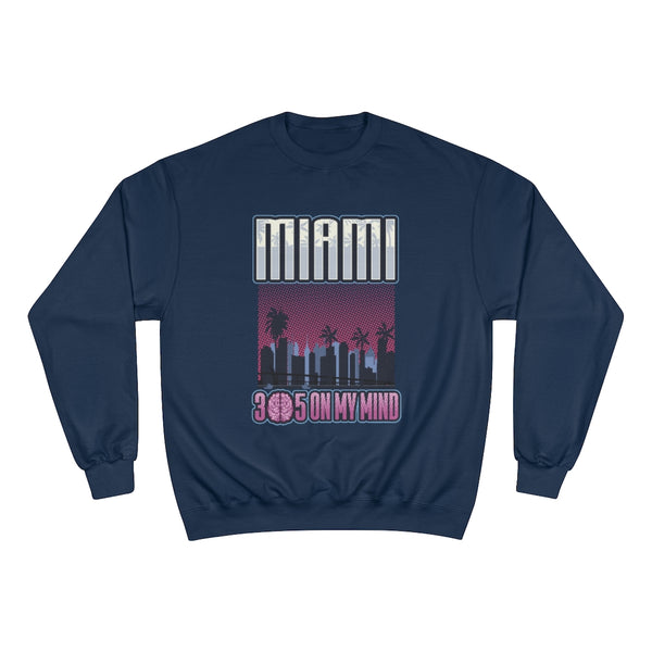 Presentamos la sudadera Miami Streetwear, una prenda elegante y única que captura la esencia de la vibrante ciudad de Miami. El diseño presenta un impresionante horizonte de Miami, que exhibe su icónica arquitectura. En la parte superior, destaca la palabra "Miami", mientras que en la inferior, el número "305" se transforma creativamente: el "0" se reemplaza por un cerebro, dándole un toque divertido. La frase "305 on my Mind" complementa a la perfección el diseño.